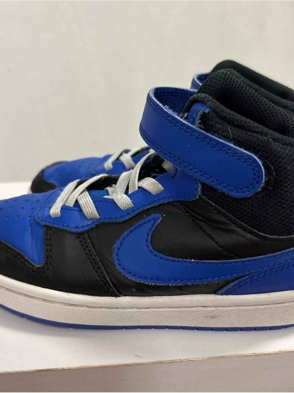 Nike Kids Mid-Top Sneakers in Black and Royal Blue